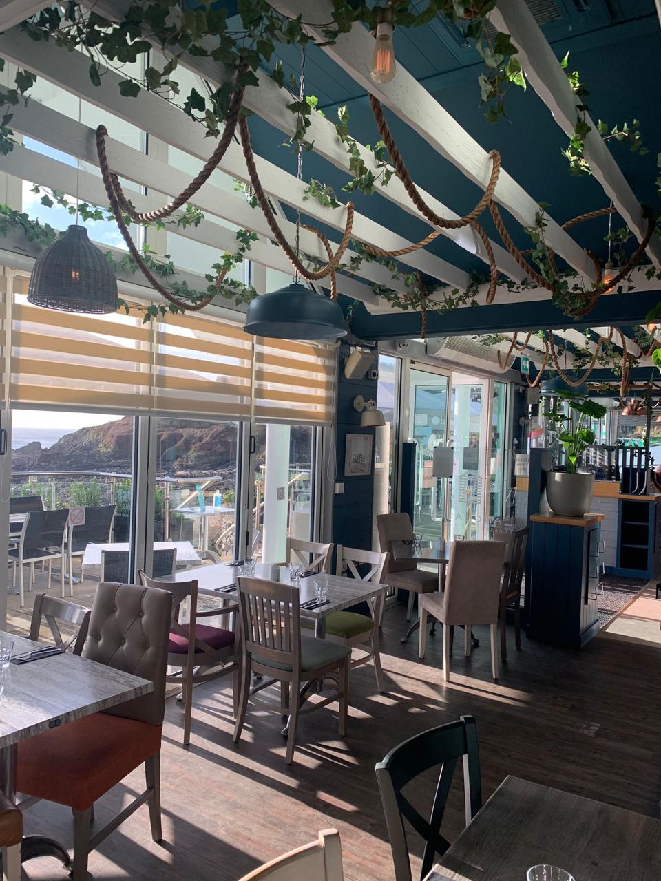 The brasserie dining for breakfast lunch and dinner with views of Langland Bay Langlands Mumbles Swansea Wales